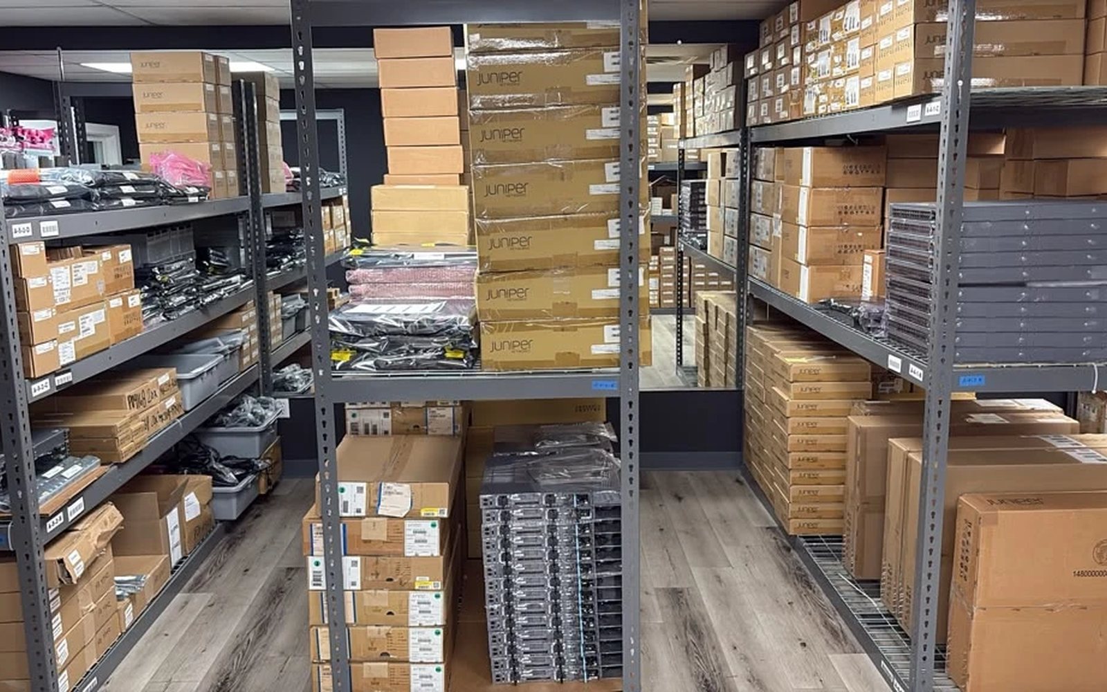 Stocked parts shelving at our Las Vegas facility, organized by bin location for trade fulfillment